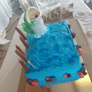 Mad Batter Bakery - a blue cake with a fish on it - Bakeries Near Me - Bullard, Texas