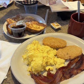 The Bagel Cafe - One hit green tea, Two eggs any style with bacon, a side of challah french toast, and hashbrowns. - Bagels Near Me - Las Vegas, Nevada The Bagel Cafe - One hit green tea, Two eggs any style with bacon, a side of challah french toast, and hashbrowns. - Bagels Near Me - Las Vegas, Nevada