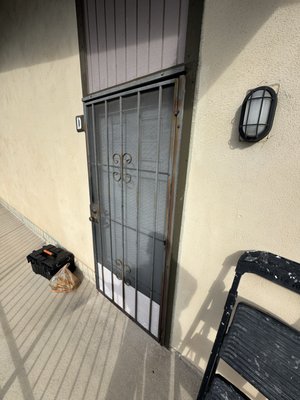 Entry Door Restoration - Completed the restoration of a steel entry door. The project began with a thorough cleaning of the surface, followed by the removal of loose paint, rust, and other signs of wear. Corroded areas were properly treated to stop further deterioration and prepare the metal for refinishing.
After surface preparation, the door was sanded, primed where needed, and professionally repainted using a durable exterior coating designed to withstand daily use and weather exposure.
The completed restoration gave the entry door a clean, refreshed appearance while improving its protection against rust, moisture, and long-term wear, extending the life of the door and enhancing the overall look of the property. Entry Door Restoration - Completed the restoration of a steel entry door. The project began with a thorough cleaning of the surface, followed by the removal of loose paint, rust, and other signs of wear. Corroded areas were properly treated to stop further deterioration and prepare the metal for refinishing.
After surface preparation, the door was sanded, primed where needed, and professionally repainted using a durable exterior coating designed to withstand daily use and weather exposure.
The completed restoration gave the entry door a clean, refreshed appearance while improving its protection against rust, moisture, and long-term wear, extending the life of the door and enhancing the overall look of the property.