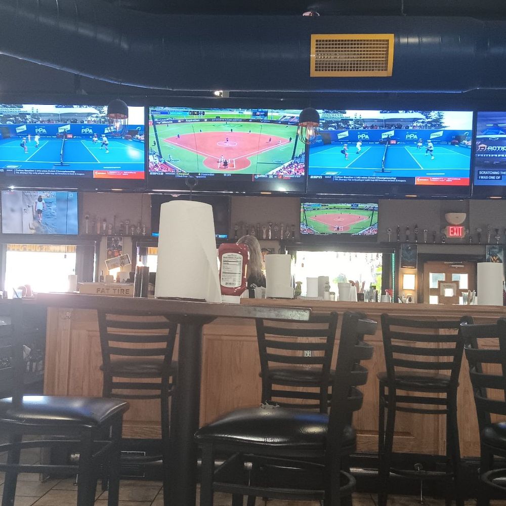 Cold Spot - a baseball game being played on televisions - Chicken Wings Near Me - Charleston, West Virginia