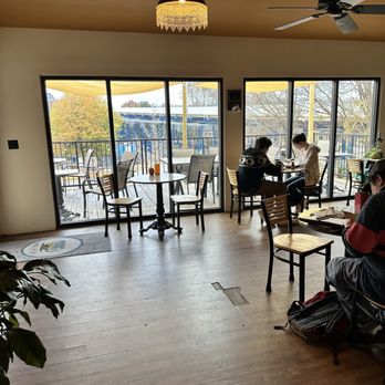 Stone Cup Cafe - Store looking out to the outside balcony - Coffee Roasteries Near Me - Chattanooga, Tennessee