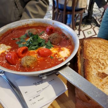Tatte Bakery & Cafe | Pier 4 - Shakshuka with lamb meatballs - Coffee & Tea Near Me - Boston, Massachusetts Tatte Bakery & Cafe | Pier 4 - Shakshuka with lamb meatballs - Coffee & Tea Near Me - Boston, Massachusetts