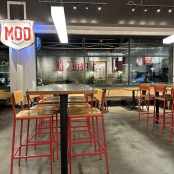 MOD Pizza - tables and chairs in a restaurant - Fast Food Near Me - Frederick, Maryland