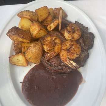 Bond 45 - Prime ribeye with potatoes and added shrimp . Delicious! - Italian Near Me - Oxon Hill, Maryland