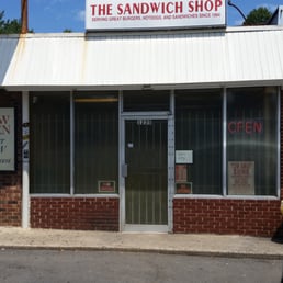 the front of a sandwich shop the front of a sandwich shop