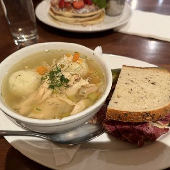 Friedman's - Chicken Matzo Ball Soup/ Pastrami on Rye - New American Near Me - New York, New York Friedman's - Chicken Matzo Ball Soup/ Pastrami on Rye - New American Near Me - New York, New York
