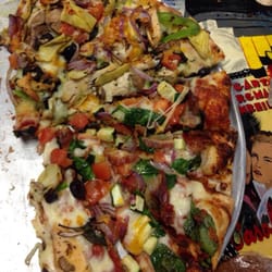 D'boni's Pizza - Pesto Supreme and Popeye. This is one of the best pizzas Ive ever had - hands down. The toppings were perfectly cooked. 100%