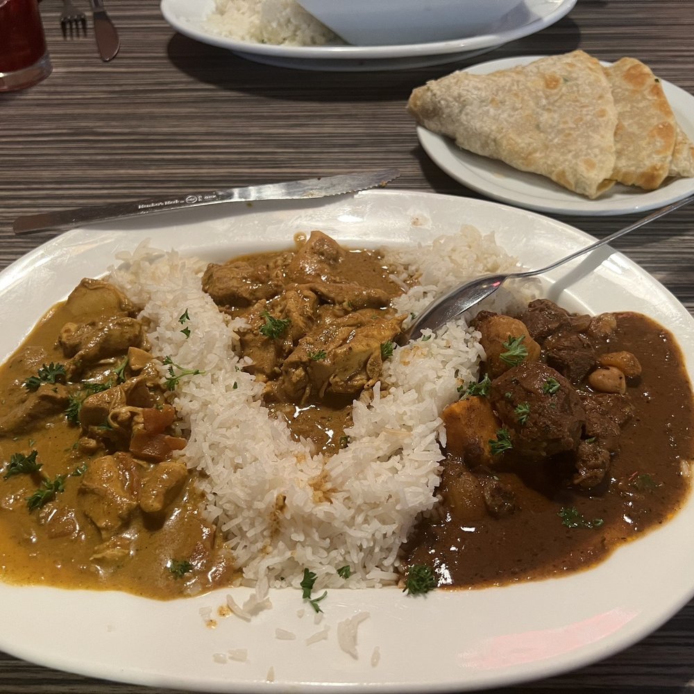 Jambo Cafe - Combination Plate with Coconut Peanut Chicken Stew, Lamb Stew and Chicken Curry - Caribbean Near Me - Santa Fe, New Mexico Jambo Cafe - Combination Plate with Coconut Peanut Chicken Stew, Lamb Stew and Chicken Curry - Caribbean Near Me - Santa Fe, New Mexico