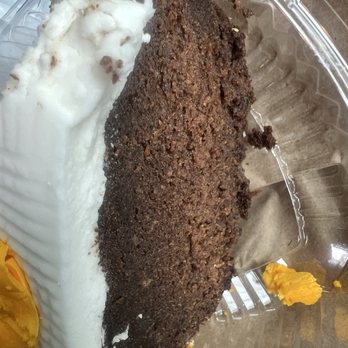 The Door - slice of Black Cake--moist although it looks a tad dry - Caribbean Near Me - Jamaica, New York The Door - slice of Black Cake--moist although it looks a tad dry - Caribbean Near Me - Jamaica, New York
