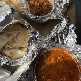 Kababish - BBQ & Grill - Butter chicken (bottom), spicy chicken with peppers (forgot the name, and naan - Indian Near Me - Chicago, Illinois
