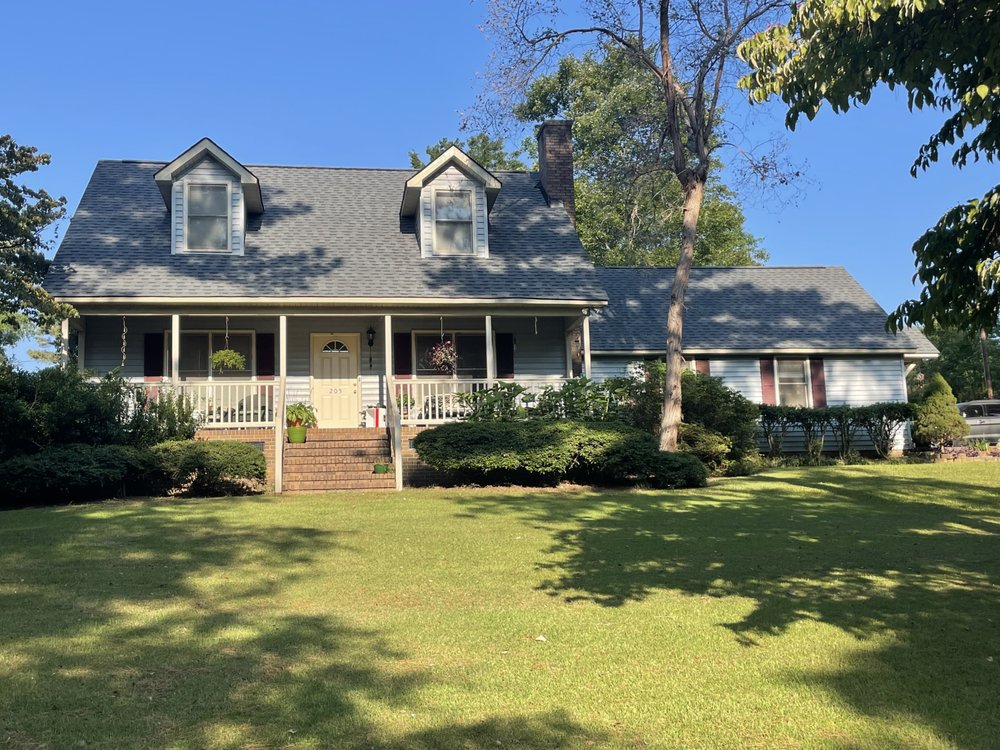 Slide of Anderson Metal Roofing and Shingles