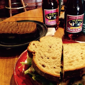 Vic and Whit's - a sandwich on a plate with a side of soda - Sandwiches Near Me - Saco, Maine