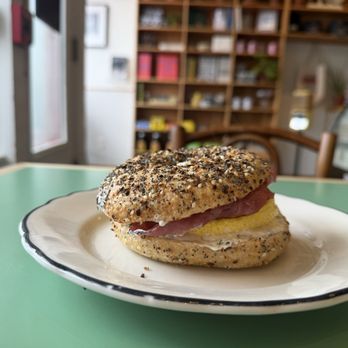 Rose Foods - Everything bagel with egg, herb cream cheese, and turkey bacon - Delis Near Me - Portland, Maine Rose Foods - Everything bagel with egg, herb cream cheese, and turkey bacon - Delis Near Me - Portland, Maine