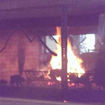 Talkeetna Alaskan Lodge - The cozy fireplace in the common area - Hotels Near Me - Talkeetna, Alaska