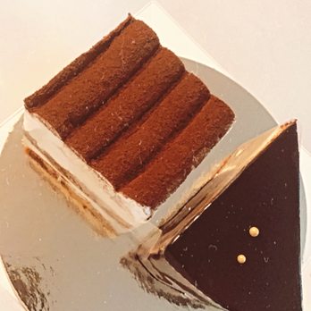 Caffe Concerto - Tiramisu on left and Chocolate Mousse Cake on right - Pizza Near Me - Los Angeles, California Caffe Concerto - Tiramisu on left and Chocolate Mousse Cake on right - Pizza Near Me - Los Angeles, California