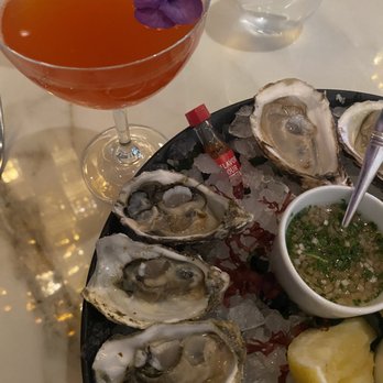 Spago - around the wheel and  Half Dozen Oysters Three East And West Coast - New American Near Me - Las Vegas, Nevada