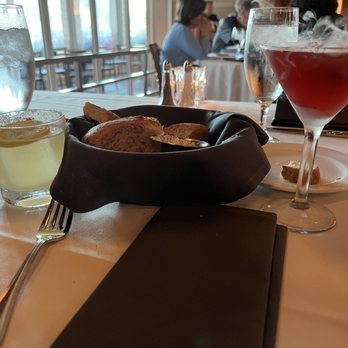 Ocean Prime - Serrano Pineaple Cocktail, Berries & Bubbles Cocktail, and a delicious bread basket - Seafood Near Me - Phoenix, Arizona Ocean Prime - Serrano Pineaple Cocktail, Berries & Bubbles Cocktail, and a delicious bread basket - Seafood Near Me - Phoenix, Arizona