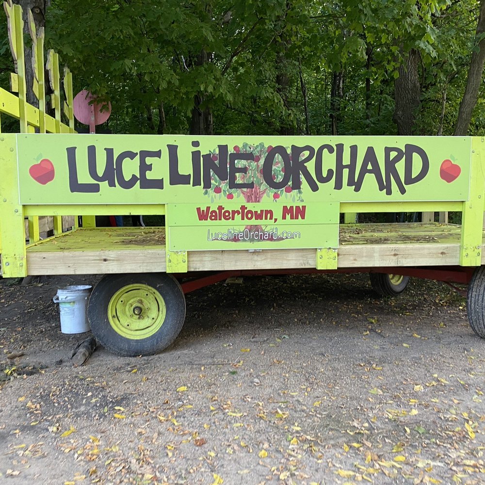 Luceline Orchard - a wagon with a sign for luceline orchard - CSA Near Me - Watertown, Minnesota