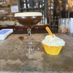 Espresso martini with a banana pudding gelato side. Adult pup cup Espresso martini with a banana pudding gelato side. Adult pup cup