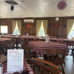 View of back dining room and menu