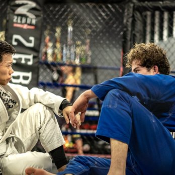 Plus One Defense Systems - Kickboxing Near Me - West Hartford, Connecticut Plus One Defense Systems - Kickboxing Near Me - West Hartford, Connecticut