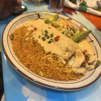 El Tapatio - Enchilada with rice - Bars Near Me - Flagstaff, Arizona El Tapatio - Enchilada with rice - Bars Near Me - Flagstaff, Arizona
