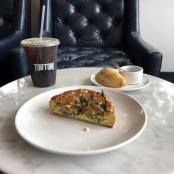 Tortoni Caffe - Spinach and mushroom quiche, and spinach empanada, and cold brew. It was INCREDIBLE. - Coffee & Tea Near Me - Sherman Oaks, California