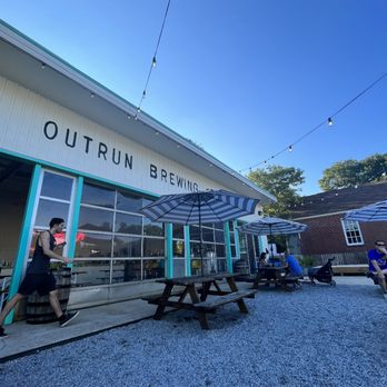 Outrun Brewing - Outdoor seating. The Corn hole boards are in the area in the back right of the photo. - Breweries Near Me - Stone Mountain, Georgia Outrun Brewing - Outdoor seating. The Corn hole boards are in the area in the back right of the photo. - Breweries Near Me - Stone Mountain, Georgia