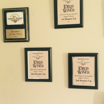 Speedy's Cowabunga - a number of plaques on a wall - Food Trucks Near Me - Springfield, Missouri Speedy's Cowabunga - a number of plaques on a wall - Food Trucks Near Me - Springfield, Missouri