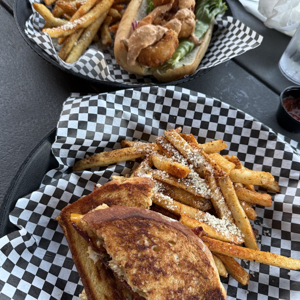 The Water Dog - Po boy (top) and crabby poppa melt (bottom) - New American Near Me - Lynchburg, Virginia The Water Dog - Po boy (top) and crabby poppa melt (bottom) - New American Near Me - Lynchburg, Virginia