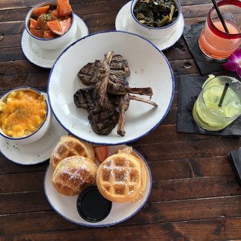 Taste Bar + Kitchen - Jerk Lambchops Candied Yams Braised Collard Green Smoked Gouda Mac and Cheese - Cocktail Bars Near Me - Houston, Texas Taste Bar + Kitchen - Jerk Lambchops Candied Yams Braised Collard Green Smoked Gouda Mac and Cheese - Cocktail Bars Near Me - Houston, Texas