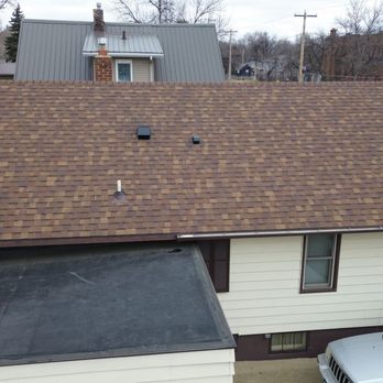 Northern Skies Roofing - Side view completed - Roofing Near Me