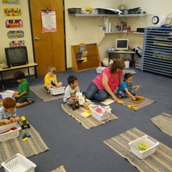 Star Montessori School & Day Care - Star Montessori School & Day Care Children working with Montessori materials