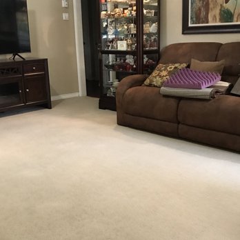Made New Again - a living room with a couch and a television - Carpet Cleaning Near Me - Dickinson, Texas Made New Again - a living room with a couch and a television - Carpet Cleaning Near Me - Dickinson, Texas