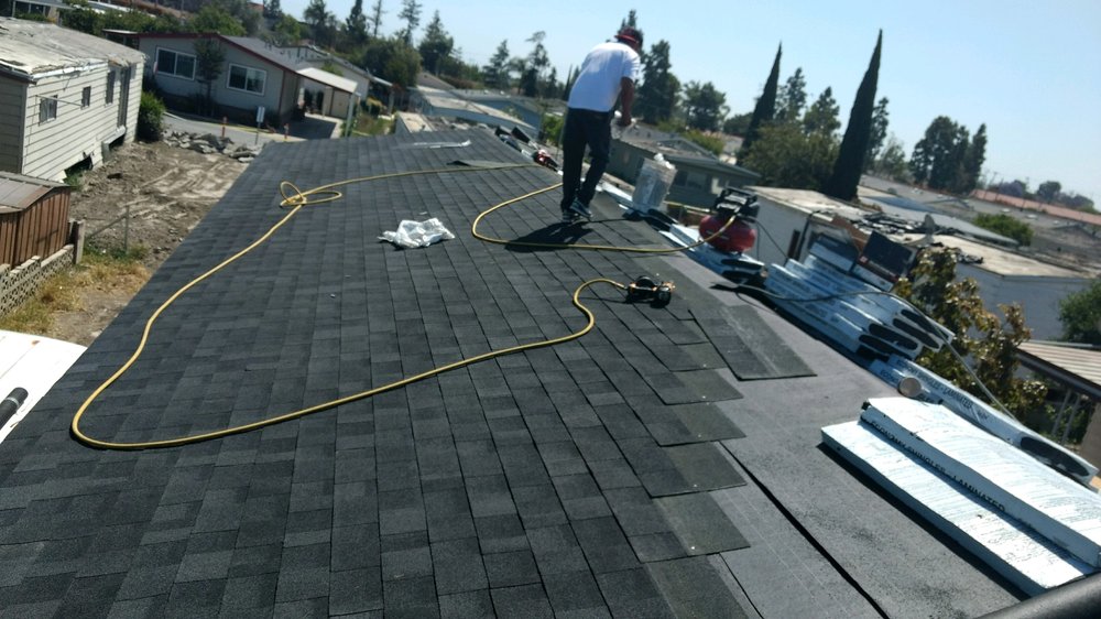 Slide of Magic Hands Roofing