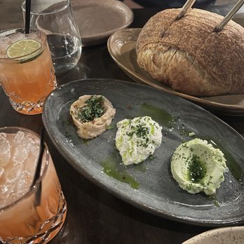 Esther's Kitchen - Housemade sourdough bread Left to right: cannellini beans, burrata, & basil ricotta - Italian Near Me - Las Vegas, Nevada