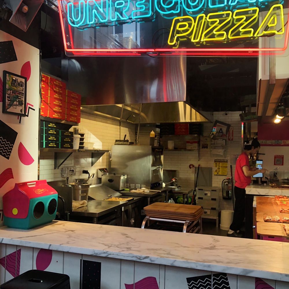 Unregular Pizza - Counter of Unregular Pizza - Pizza Near Me - New York, New York Unregular Pizza - Counter of Unregular Pizza - Pizza Near Me - New York, New York