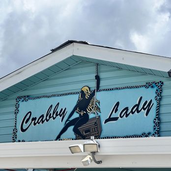 Crabby Lady - a crabby lady painted on the side of a building - Seafood Near Me - Goodland, Florida Crabby Lady - a crabby lady painted on the side of a building - Seafood Near Me - Goodland, Florida