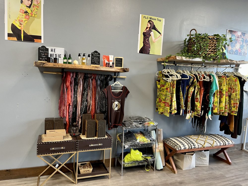 Free Love Clothing and Wellness Center Logo