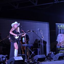Slidell Heritage Festival - Karen Waldrup Mandeville native on The Voice. She was really good. & announced raffle items winners at end of show.