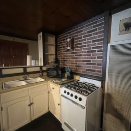 Old kitchen and nasty looking appliances