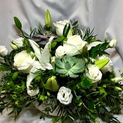 Michelle's Floral Boutique - All white with sucuclents. Lilies, roses, lisianthus and bupleurum