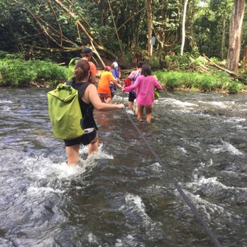 Kayak Adventures - Crossing the Wailua river on our hike up to the falls. - Rafting/Kayaking Near Me - Kapaa, Hawaii