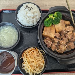Pork spare ribs set with shredded potatoes as the side