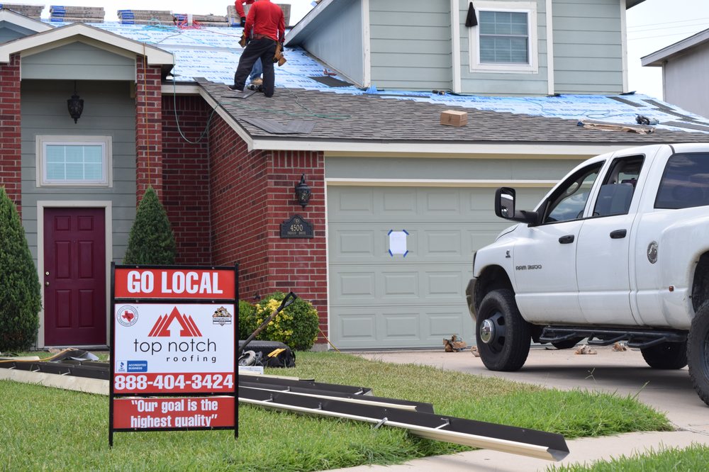 Slide of Top Notch Roofing