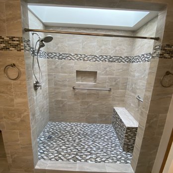 Woods Brothers Remodeling & Construction - New tile shower with seat - General Contractors Near Me Woods Brothers Remodeling & Construction - New tile shower with seat - General Contractors Near Me