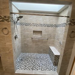 Woods Brothers Remodeling & Construction - New tile shower with seat