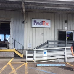 FedEx Ship Center - The map drops you off in the middle of a road next to the backside of the airport. Continue & make the right turn.