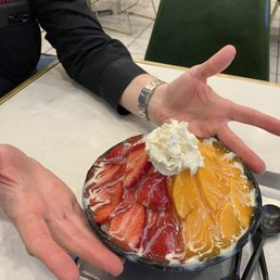 Strawberry mango shaved snow- hands for size reference!