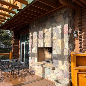 Overlander Mountain Lodge - Outdoor fireplace. - Hotels Near Me - Hinton, Alberta